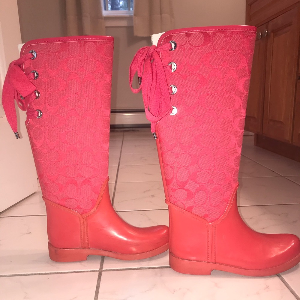 Hot pink Coach rain boots